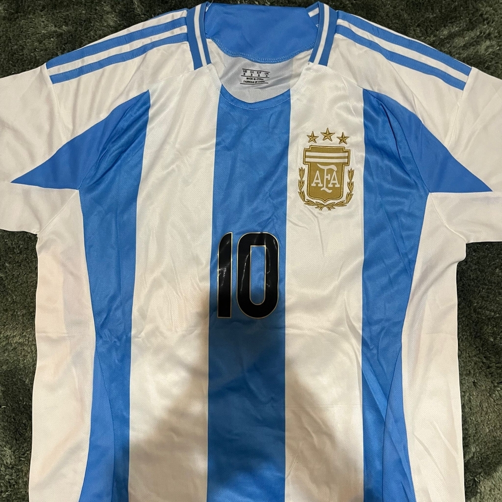 Blue and White Striped Soccer Jersey